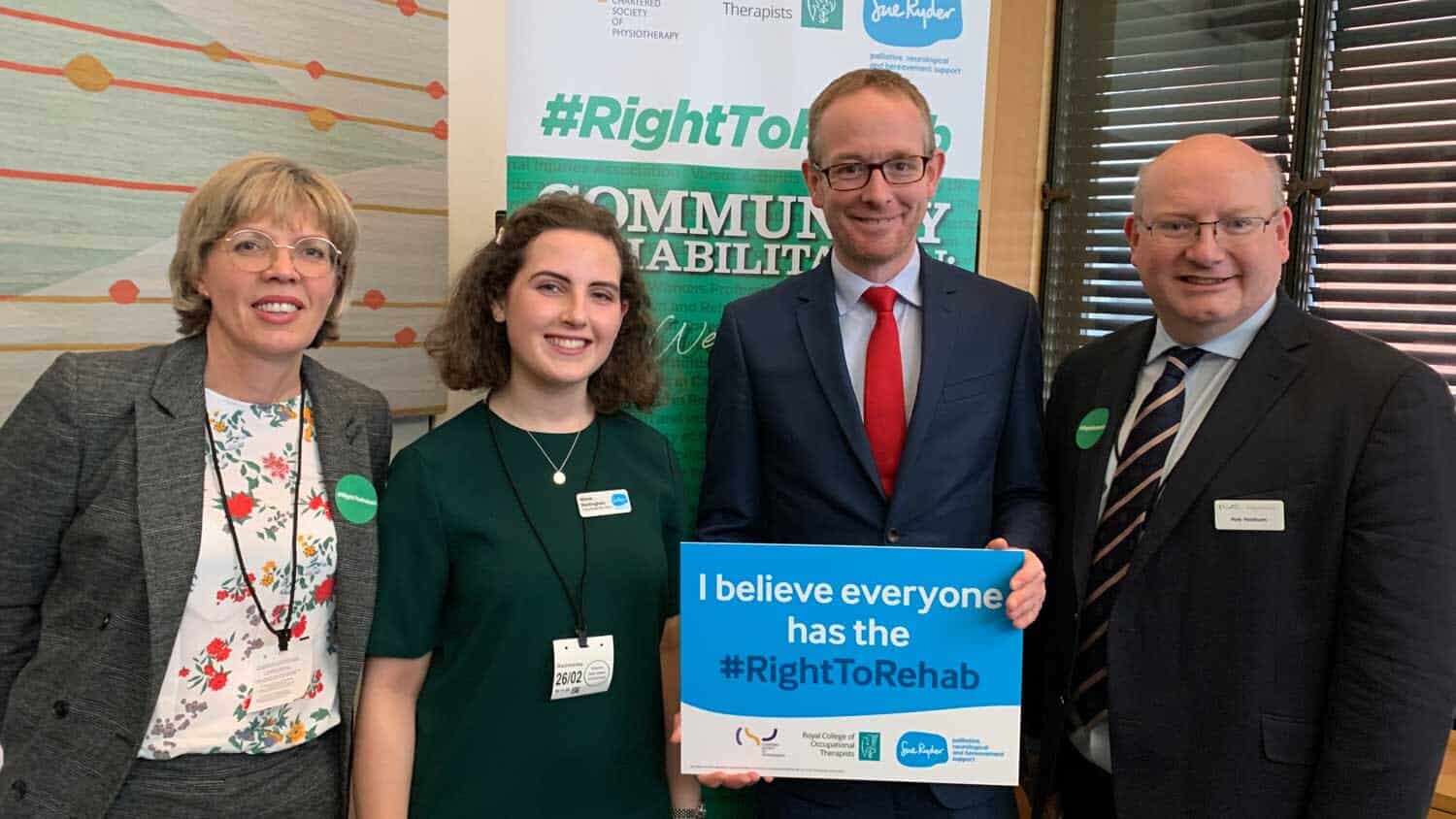 people holding a sign