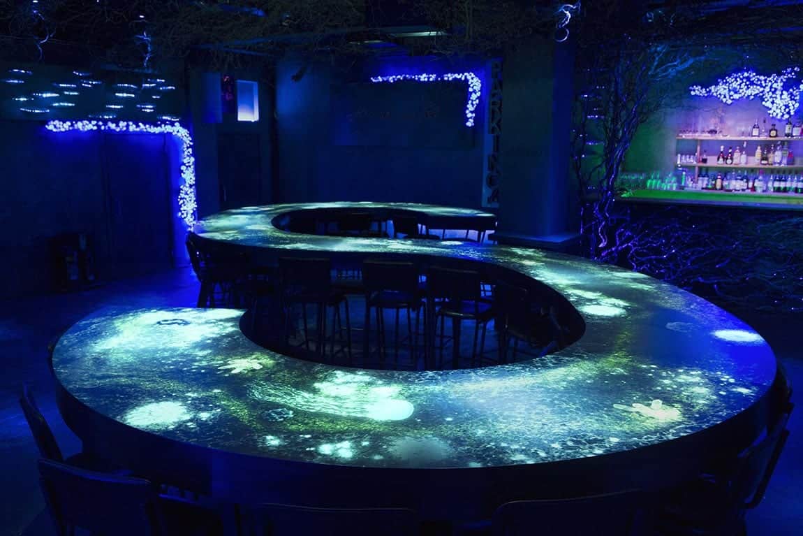 somnai_bar_experience projection mapped table at a themed bar experience